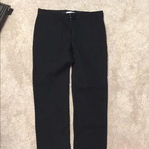 Black stovepipe pants